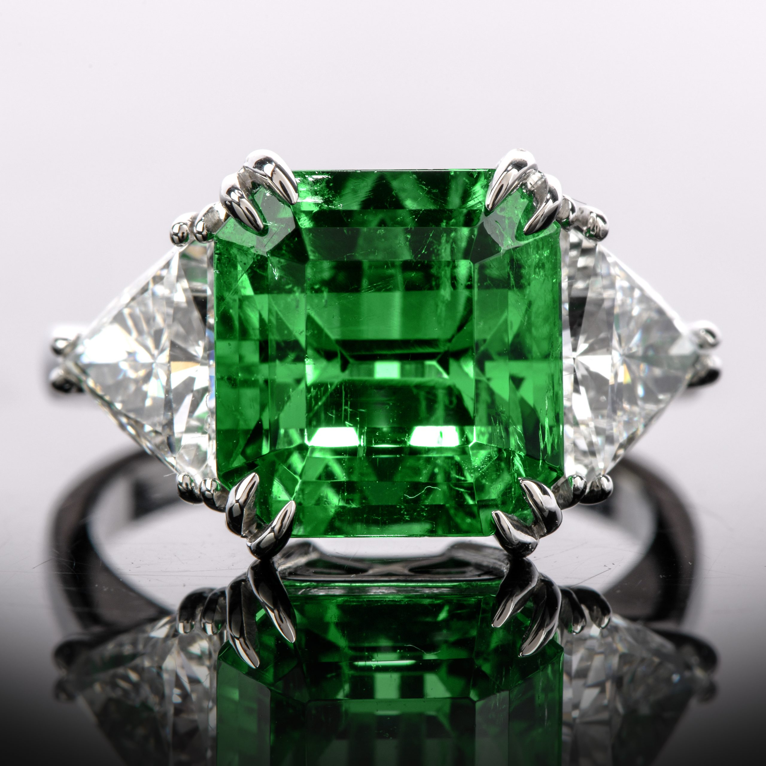 https://www.doverjewelry.com/estate-mayors-certified-3-03ct-colombian-emerald-diamond-platinum-cocktail-ring.html