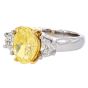 3.02cts Fancy Yellow Oval Diamond Platinum Three Stone Engagement Ring