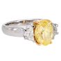 GIA 3.02cts Fancy Yellow Oval Diamond Platinum Three Stone Engagement Ring