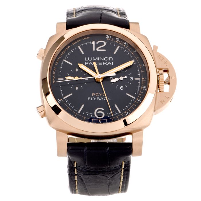 tachymeter gold watch